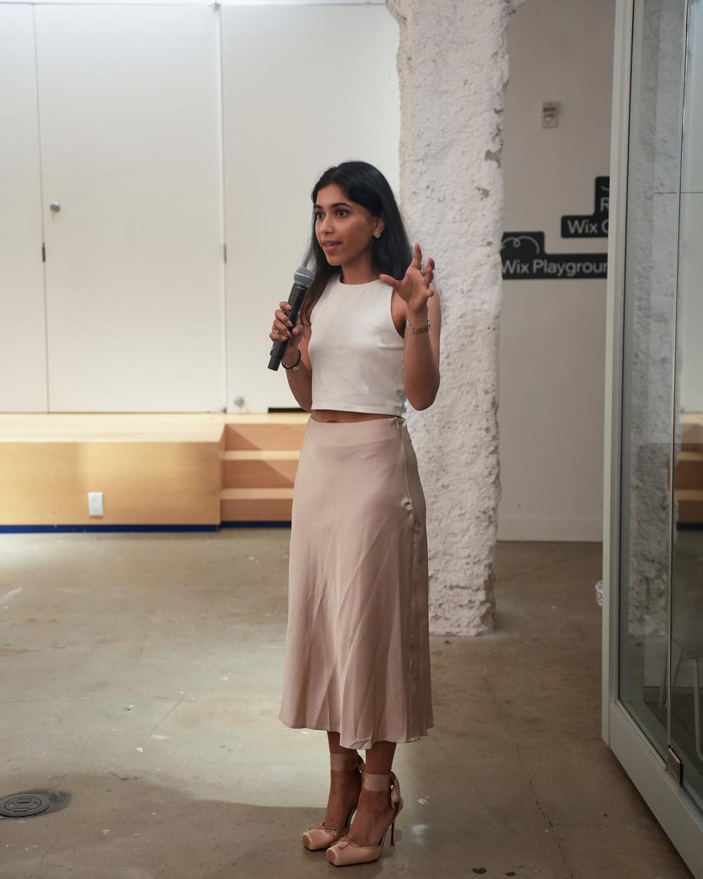 Sharon Rao speaking to the room